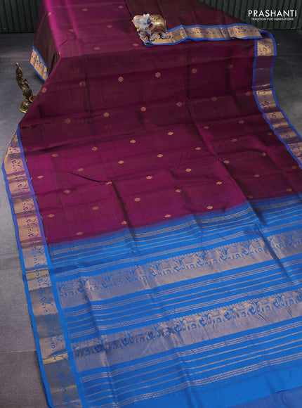 Silk cotton saree purple and cs blue with allover vairosi weaves & buttas and elephant zari woven border