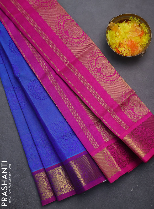 Silk cotton saree dual shade of blue and pink with allover self emboss jacquard and zari woven annam border
