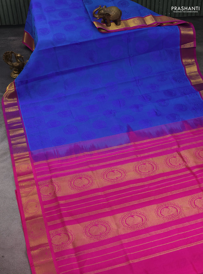 Silk cotton saree dual shade of blue and pink with allover self emboss jacquard and zari woven annam border
