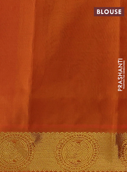 Silk cotton saree dual shade of reddish purple and orange with allover self emboss jacquard and annam zari woven border