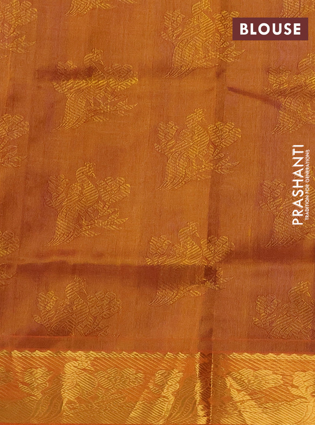 Silk cotton saree dual shade of blue and orange with allover self emboss jacquard and peacock zari woven border