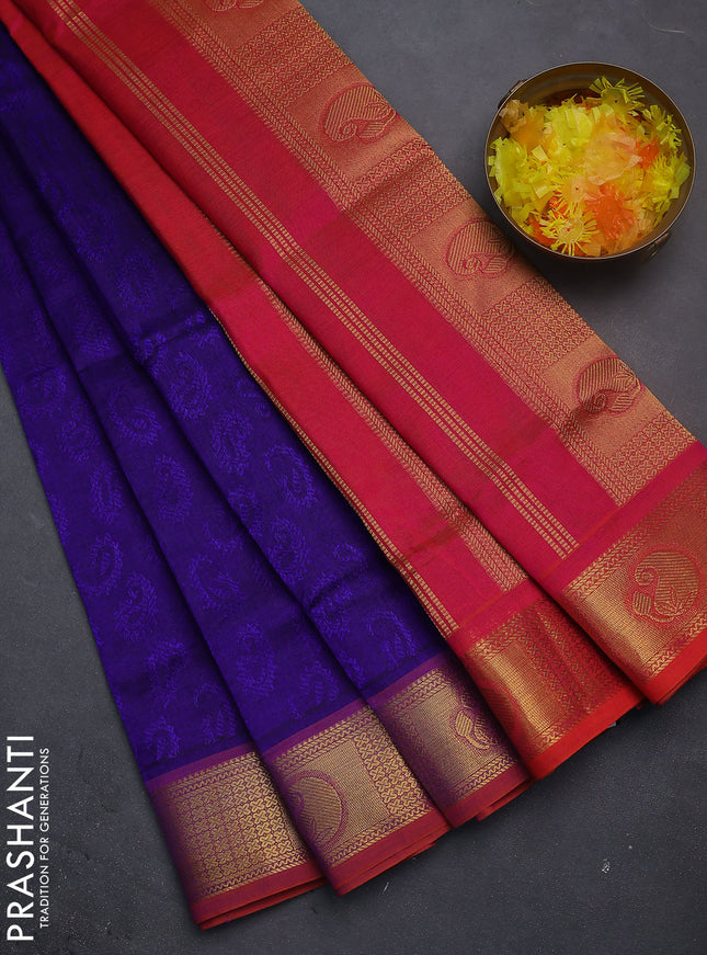 Silk cotton saree blue and dual shade of pinkish orange with allover self emboss jacquard and zari woven border