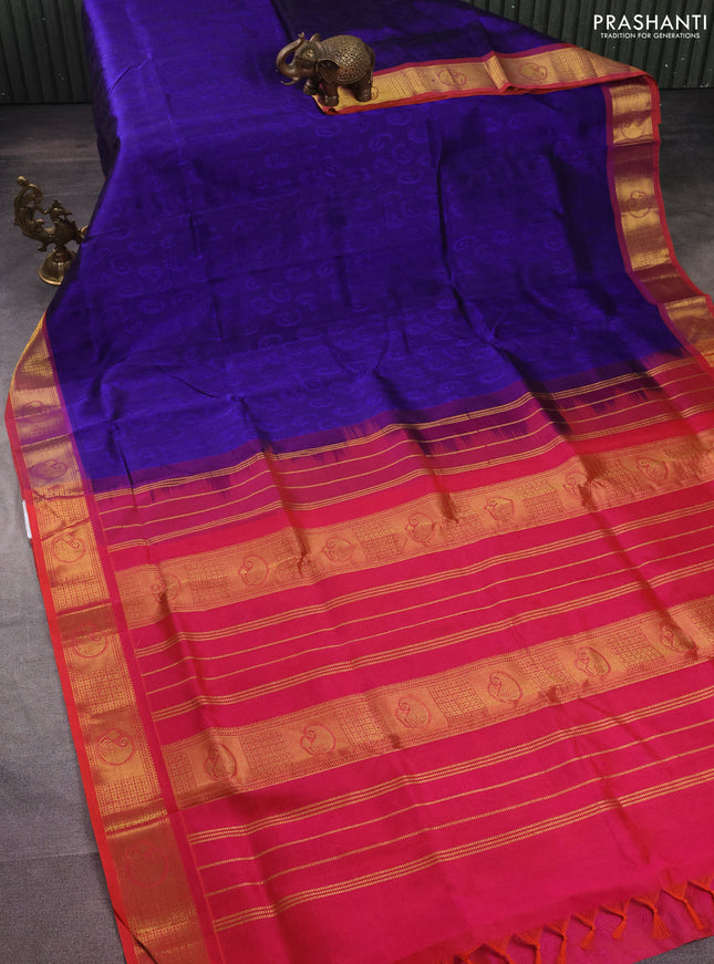 Silk cotton saree blue and dual shade of pinkish orange with allover self emboss jacquard and zari woven border