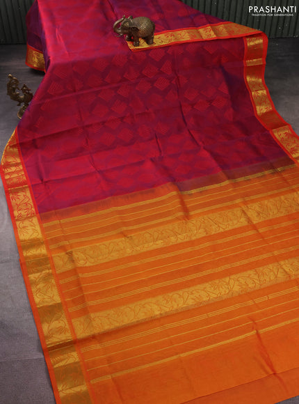 Silk cotton saree dual shade of reddish purple and orange with allover self emboss jacquard and zari woven border