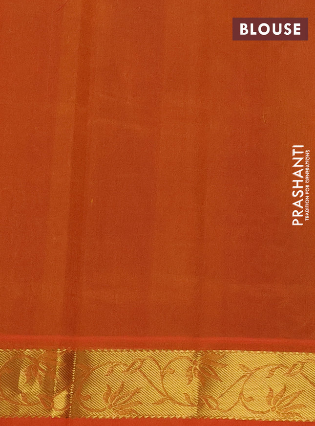 Silk cotton saree dual shade of reddish purple and orange with allover self emboss jacquard and zari woven border
