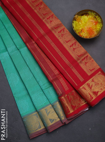 Silk cotton saree teal green shade and red with allover self emboss jacquard and annam zari woven border
