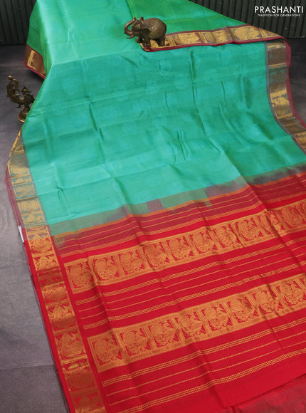Silk cotton saree teal green shade and red with allover self emboss jacquard and annam zari woven border