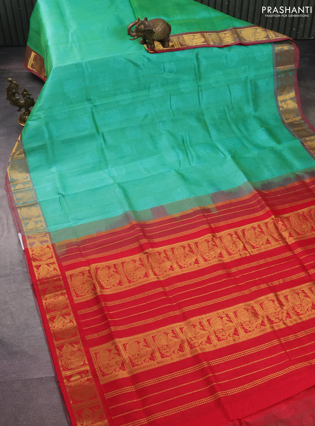Silk cotton saree teal green shade and red with allover self emboss jacquard and annam zari woven border