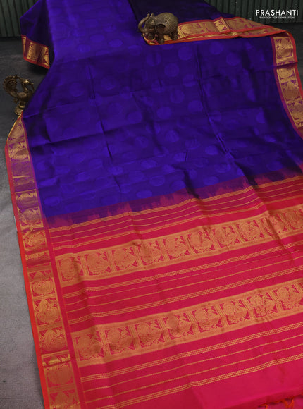Silk cotton saree blue and dual shade of pinkish orange with allover self emboss jacquard and annam zari woven border