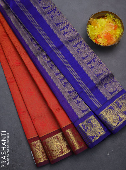 Silk cotton saree dual shade of orange and blue with allover self emboss jacquard and zari woven annam border