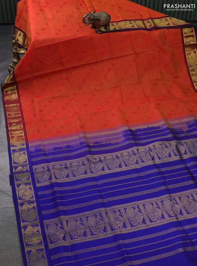 Silk cotton saree dual shade of orange and blue with allover self emboss jacquard and zari woven annam border