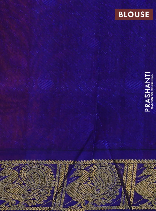 Silk cotton saree dual shade of orange and blue with allover self emboss jacquard and zari woven annam border