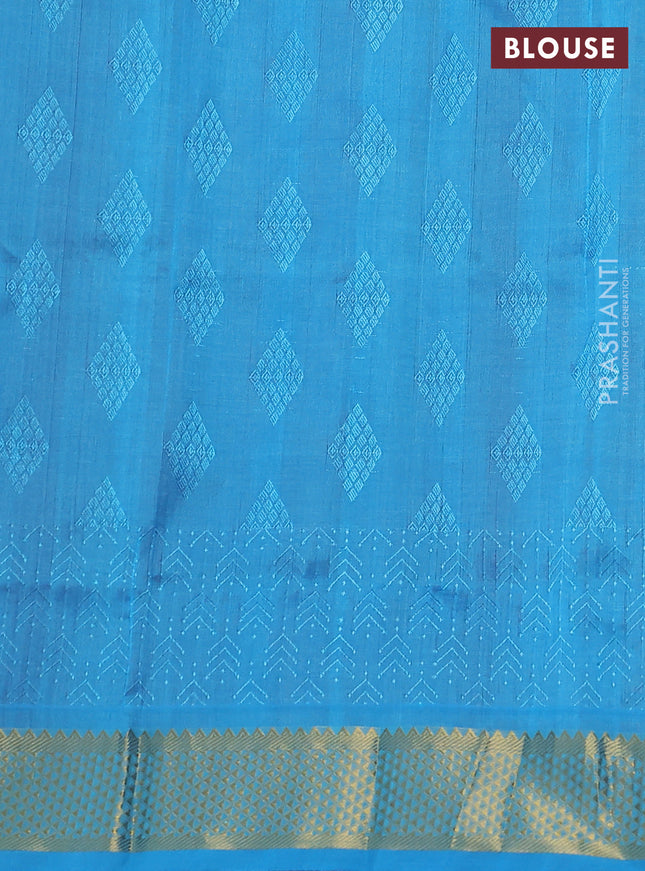 Silk cotton saree dual shade of maroon and blue with allover self emboss jacquard and zari woven border