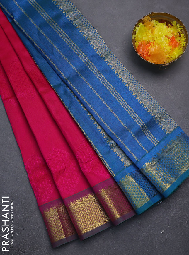 Silk cotton saree pink and dual shade of teal bluish green with allover self emboss jacquard and zari woven border
