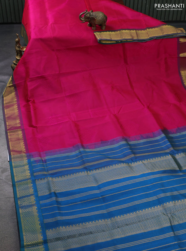 Silk cotton saree pink and dual shade of teal bluish green with allover self emboss jacquard and zari woven border