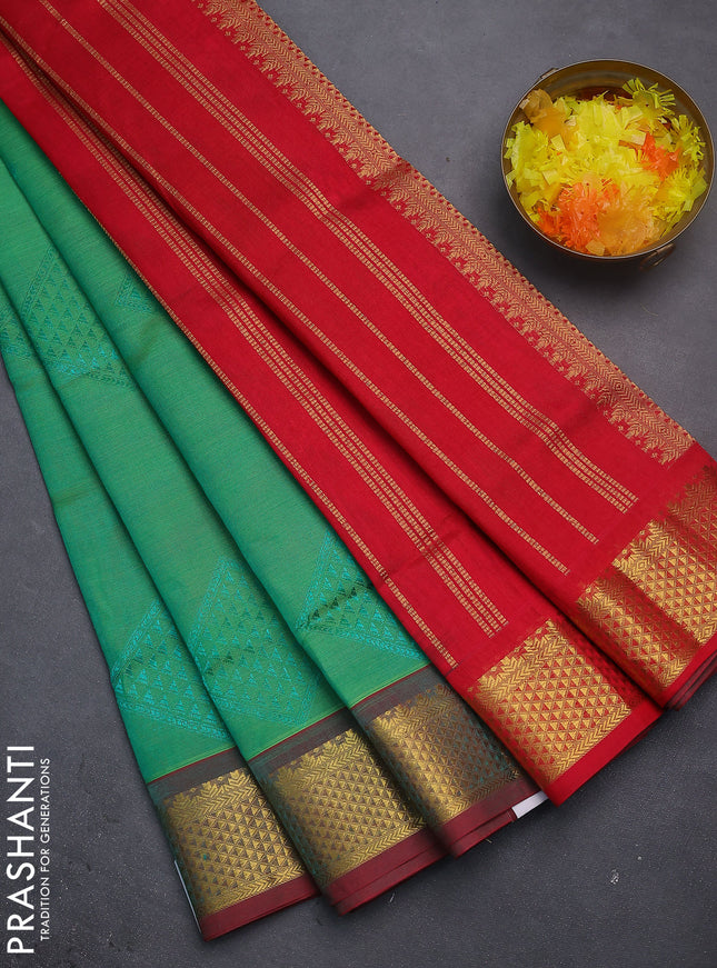 Silk cotton saree green and red with allover self emboss jacquard and zari woven border