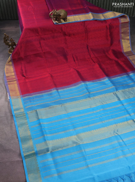 Silk cotton saree dual shade of maroon and blue with allover self emboss jacquard and zari woven border
