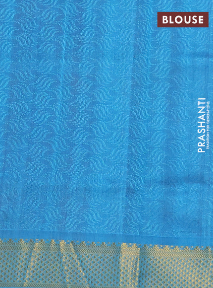 Silk cotton saree dual shade of maroon and blue with allover self emboss jacquard and zari woven border