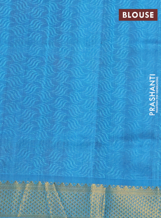 Silk cotton saree dual shade of maroon and blue with allover self emboss jacquard and zari woven border
