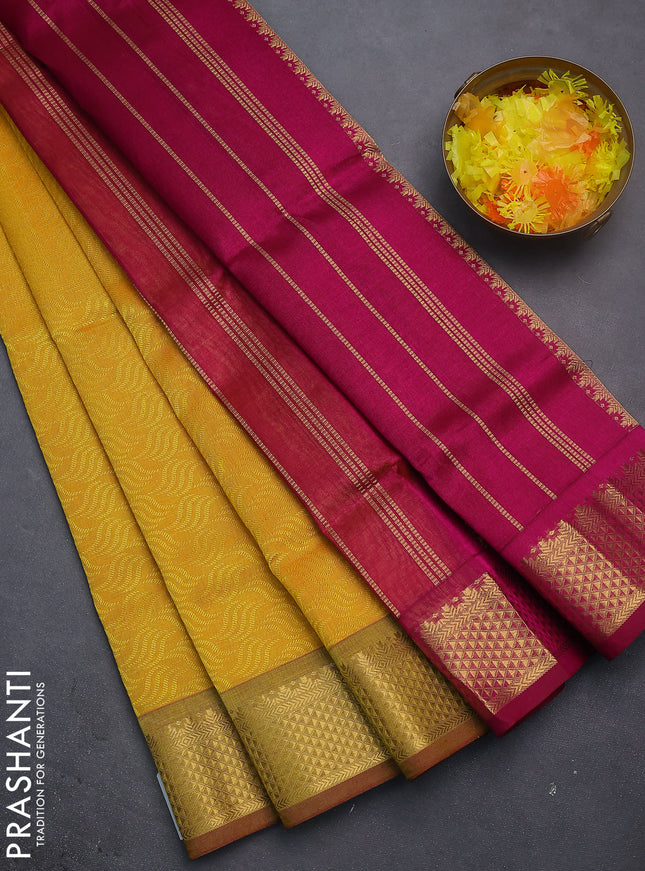 Silk cotton saree dual shade of yellow and magenta pink with allover self emboss jacquard and zari woven border