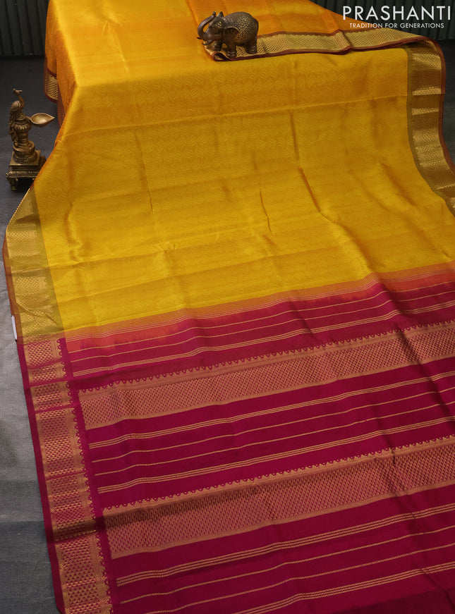 Silk cotton saree dual shade of yellow and magenta pink with allover self emboss jacquard and zari woven border