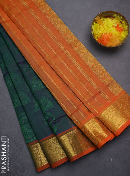 Silk cotton saree dual shade of greenish violet and dual shade of orange with allover self emboss jacquard and zari woven border