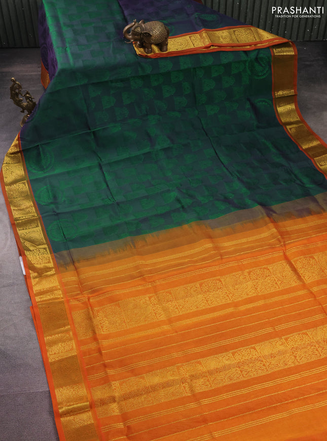 Silk cotton saree dual shade of greenish violet and dual shade of orange with allover self emboss jacquard and zari woven border