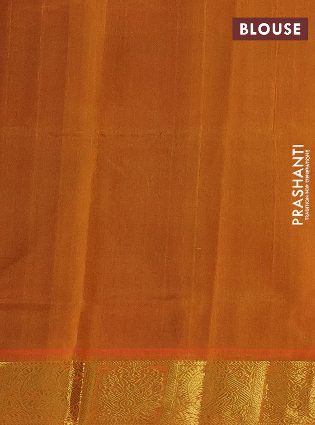 Silk cotton saree dual shade of greenish violet and dual shade of orange with allover self emboss jacquard and zari woven border