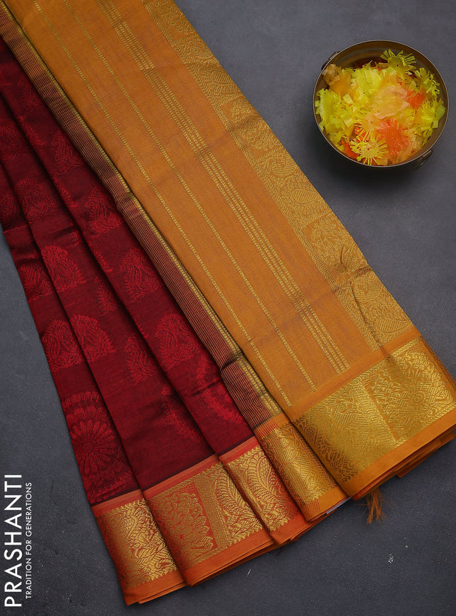 Silk cotton saree maroon and mustard yellow with allover self emboss jacquard and zari woven border