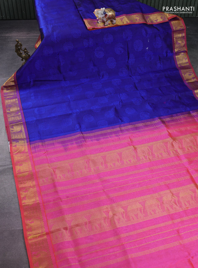 Silk cotton saree blue and dual shade of pinkish orange with allover self emboss jacquard and elephant zari woven border