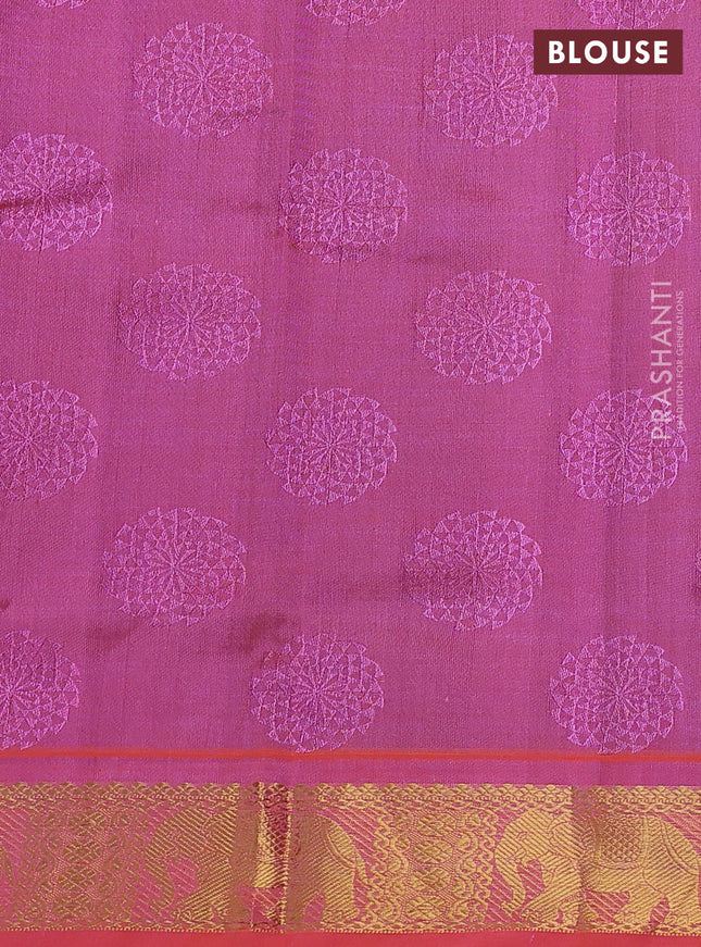 Silk cotton saree blue and dual shade of pinkish orange with allover self emboss jacquard and elephant zari woven border