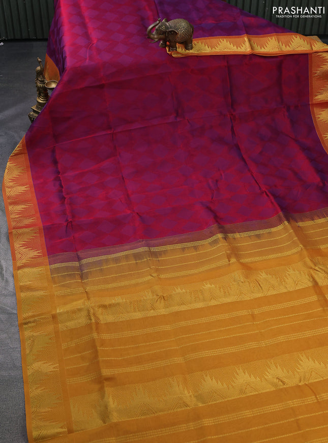 Silk cotton saree dual shade of purple and mustard yellow with allover self emboss jacquard and zari woven border