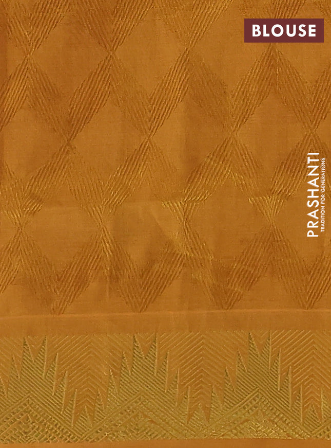 Silk cotton saree dual shade of purple and mustard yellow with allover self emboss jacquard and zari woven border