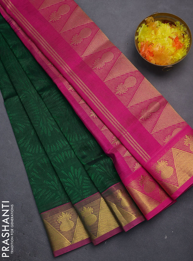 Silk cotton saree green and pink with allover self emboss jacquard and zari woven border