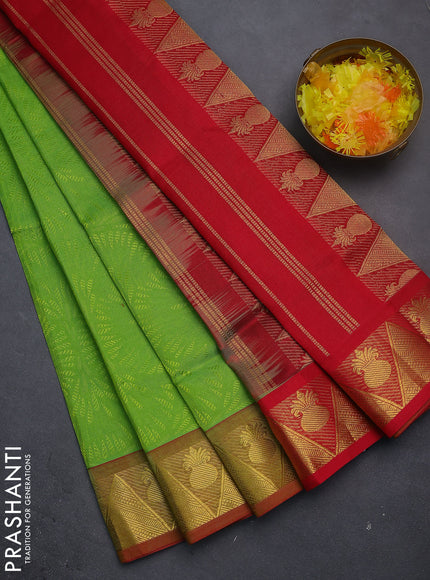 Silk cotton saree light green and red with allover self emboss jacquard and zari woven border