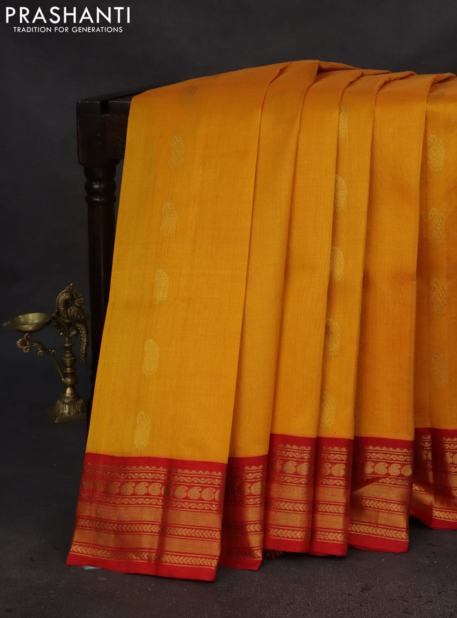 Kuppadam silk cotton saree yellow and red with paisley zari woven buttas and zari woven border