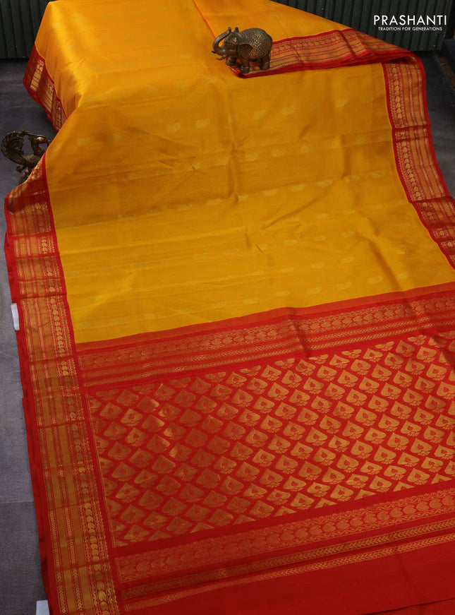 Kuppadam silk cotton saree yellow and red with paisley zari woven buttas and zari woven border
