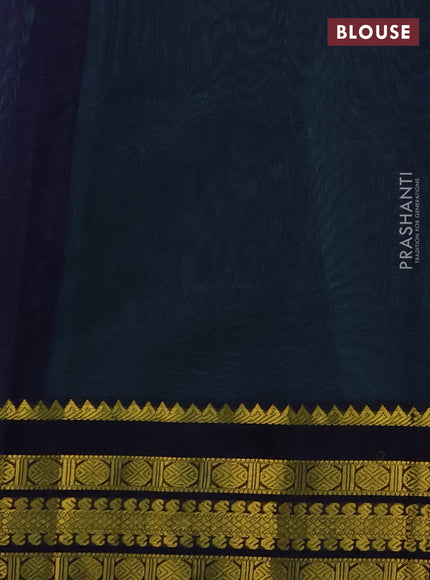 Kuppadam silk cotton saree teal green and navy blue with plain body and zari woven border