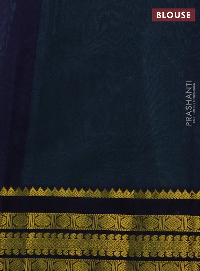 Kuppadam silk cotton saree teal green and navy blue with plain body and zari woven border