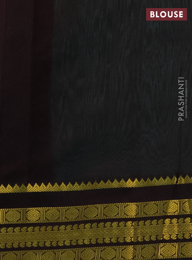 Kuppadam silk cotton saree teal green and deep coffee brown with plain body and zari woven border