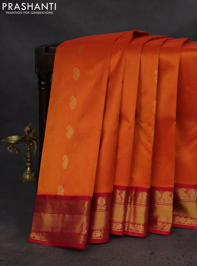 Kuppadam silk cotton saree mustard yellow and pink with paisley zari woven buttas and zari woven border