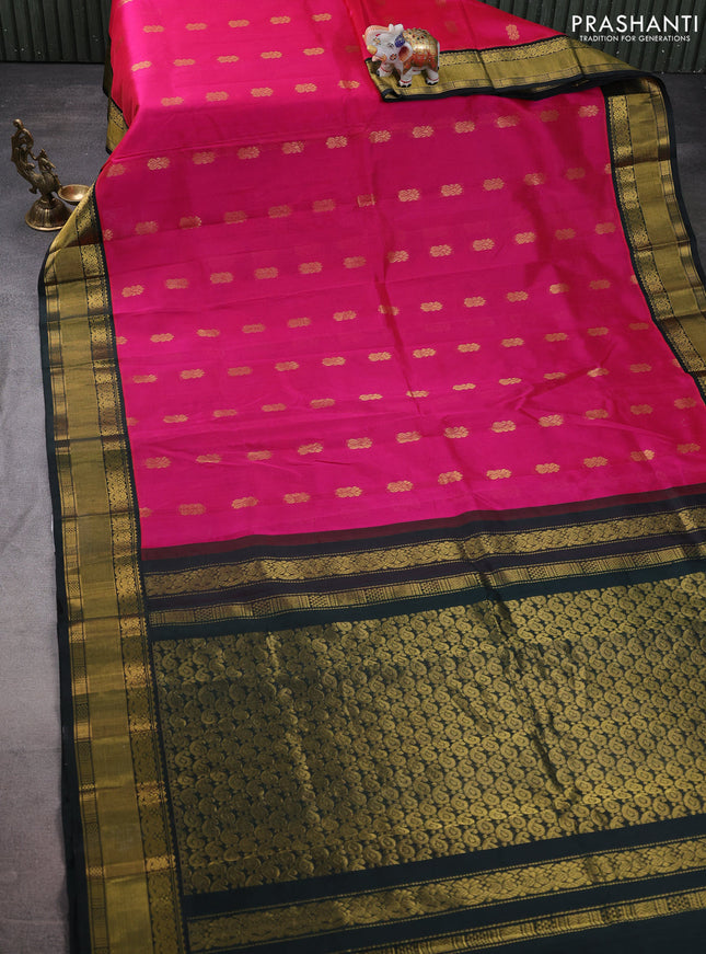 Kuppadam silk cotton saree pink and bottle green with zari woven buttas and zari woven border