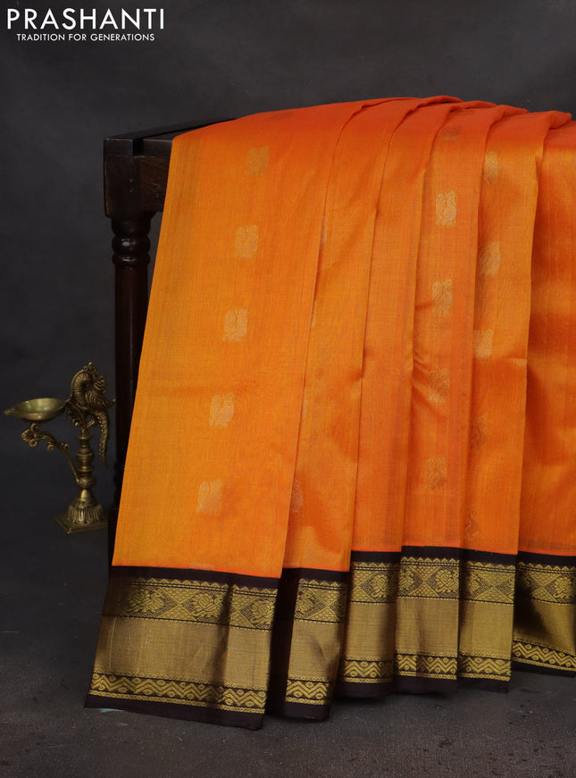 Kuppadam silk cotton saree mango yellow and deep coffee brown with annam zari woven buttas and zari woven border