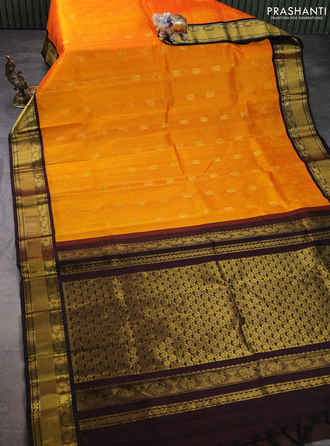 Kuppadam silk cotton saree mango yellow and deep coffee brown with annam zari woven buttas and zari woven border