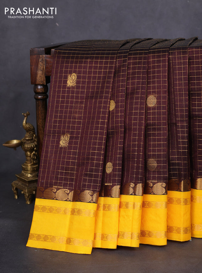 Kuppadam silk cotton saree brown and mango yellow with allover zari checks & rudhraksha annam buttas and paisley zari woven border