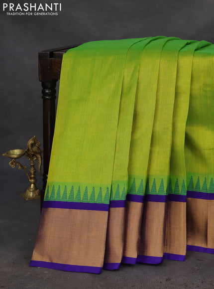 Kuppadam silk cotton saree light green and blue with plain body and temple design zari woven border