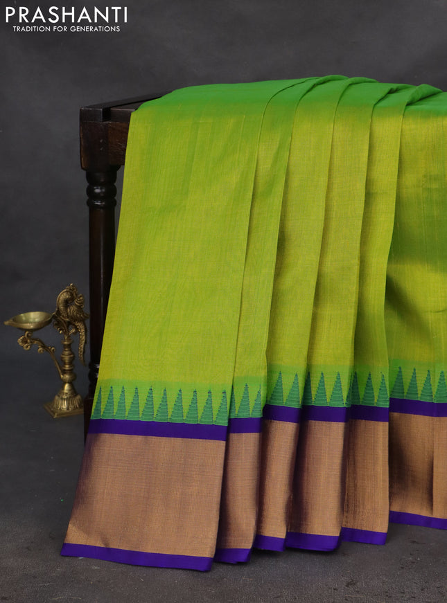 Kuppadam silk cotton saree light green and blue with plain body and temple design zari woven border