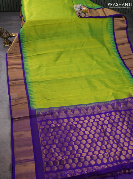 Kuppadam silk cotton saree light green and blue with plain body and temple design zari woven border
