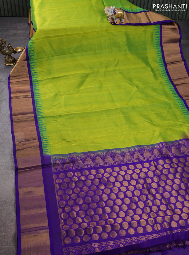 Kuppadam silk cotton saree light green and blue with plain body and temple design zari woven border
