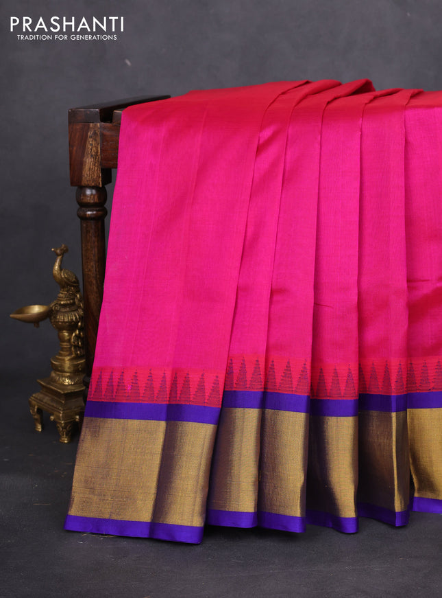 Kuppadam silk cotton saree dark pink and violet with plain body and temple design zari woven border